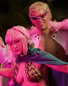 Rebecca and Doflamingo cosplays from the hit manga and anime series One Piece