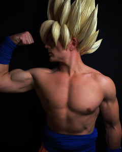Goku cosplayer showing off fit physique