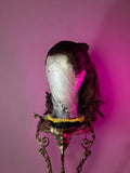 Halsin Cosplay wig from Baldur's Gate 3. Halsin cosplay wig commission on a mannequin head with a wig on an ornate stand against a pink background